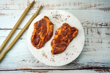 Neuland Nackensteak vom Schwein mariniert 2 stk à 150g